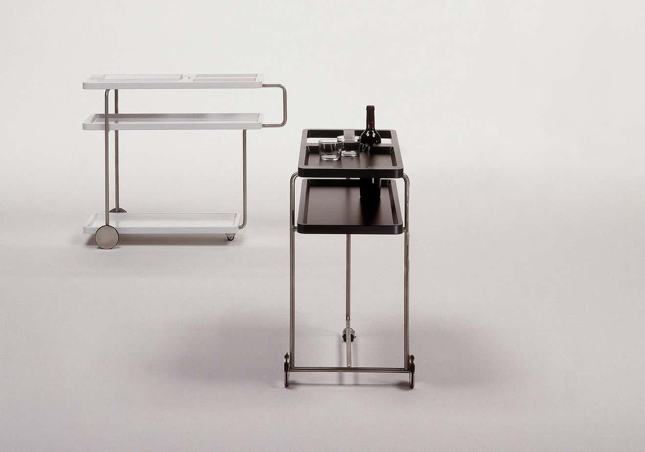 Black cocktail serving bar trolley chromed finish

Materials: 
Iron, plastic

Dimensions: 
D 43 cm x W 91 cm x H 73 cm. 

“Looking for lost ideas with a cup in one hand, there came to mind simple solutions with little details of invention,