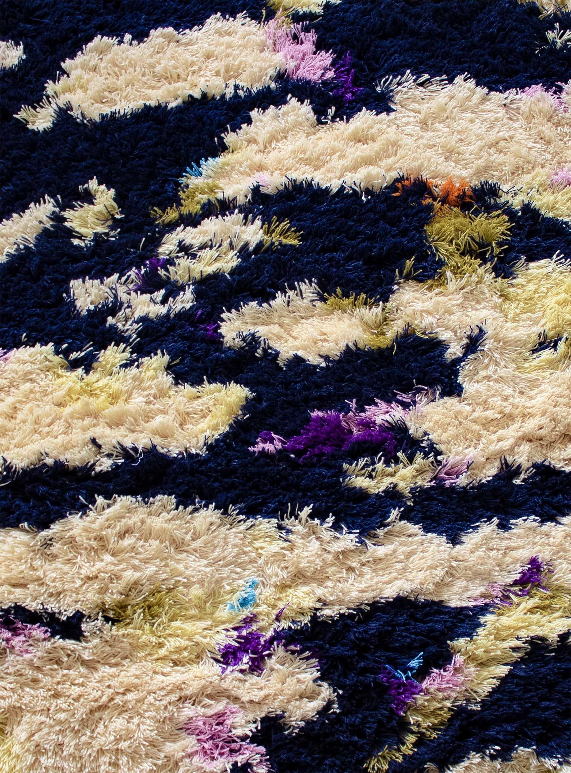A shaggy wool rug inspired by the blueberry and cloudberry filled spring/summer landscapes of northern Sweden.

Size: 5 x 7 ft 
Material: Wool
Color: Mixed*
Made in Sweden

*Colors may vary due to lighting and photography