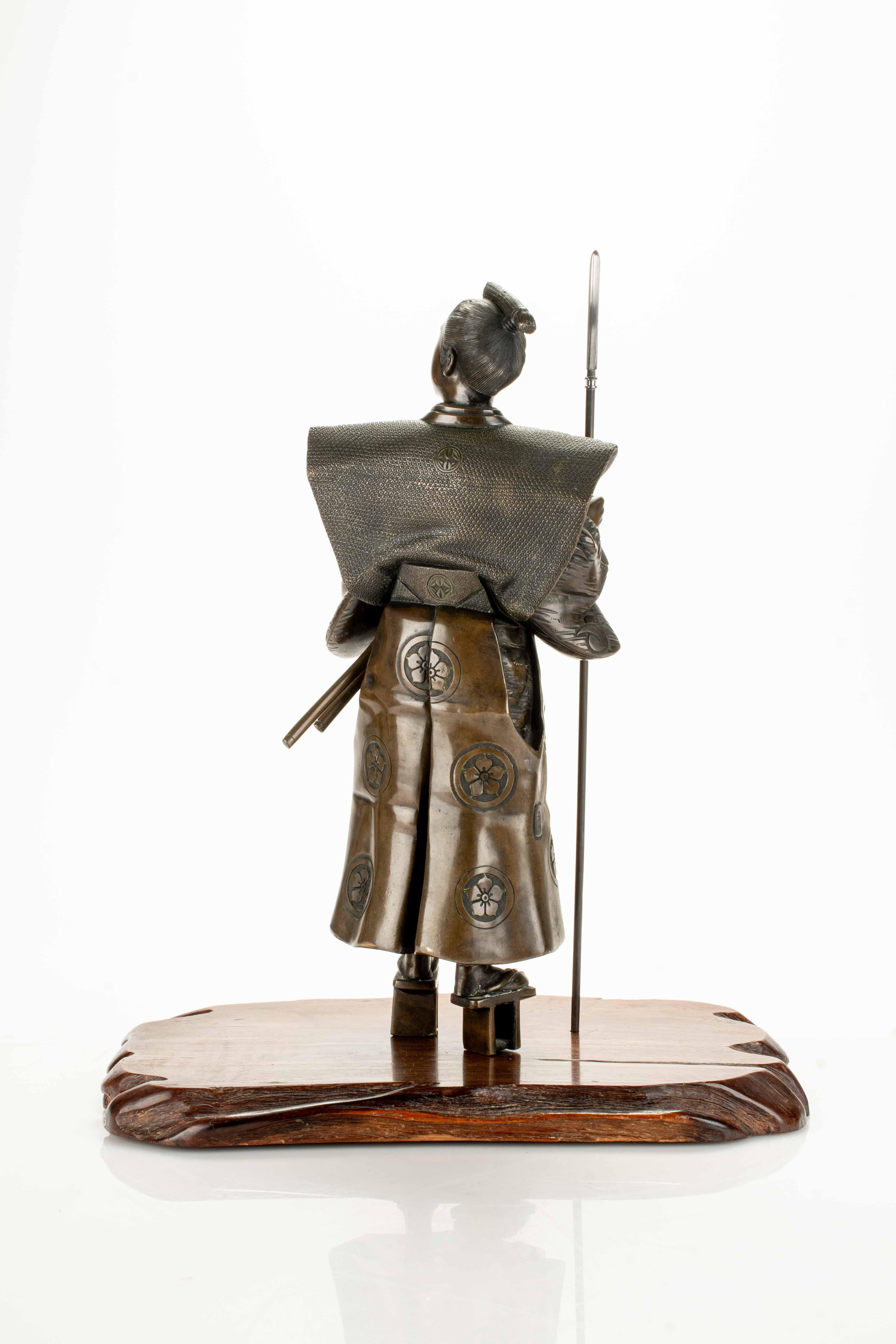 Engraved Impressive bronze sculpture depicting a samurai, signedYoshimitsu