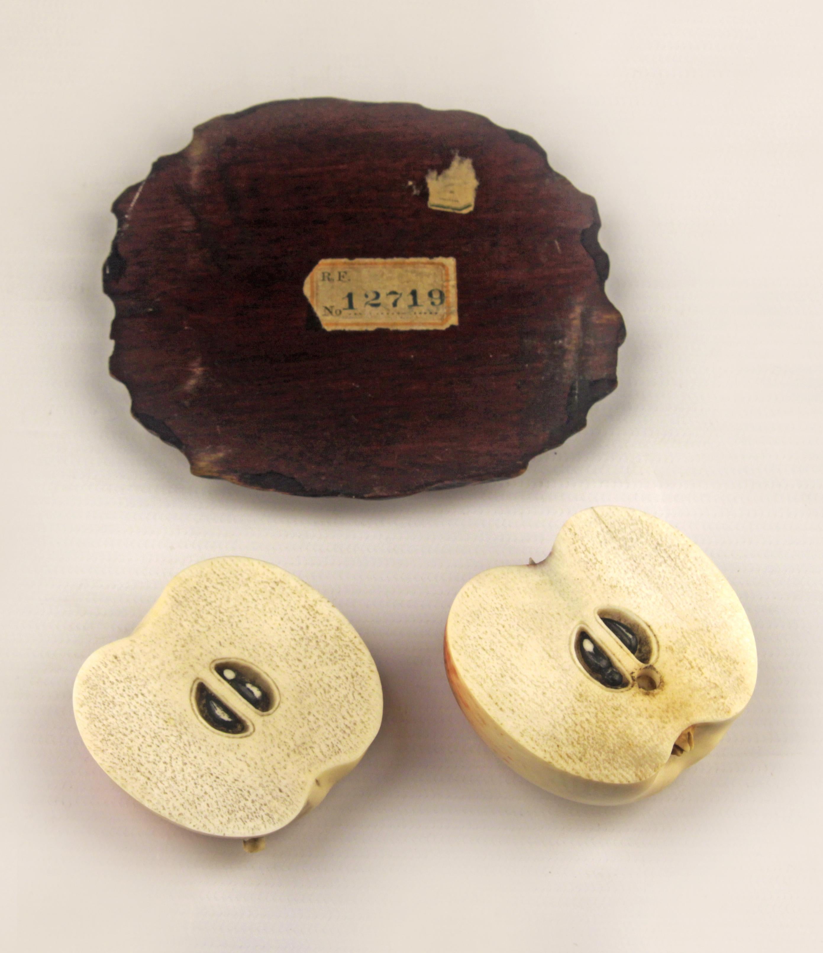 Okimono Set of Carved Red Apple-Shapped Ivory Figurines with a Wooden Brown Base In Fair Condition For Sale In North Miami, FL