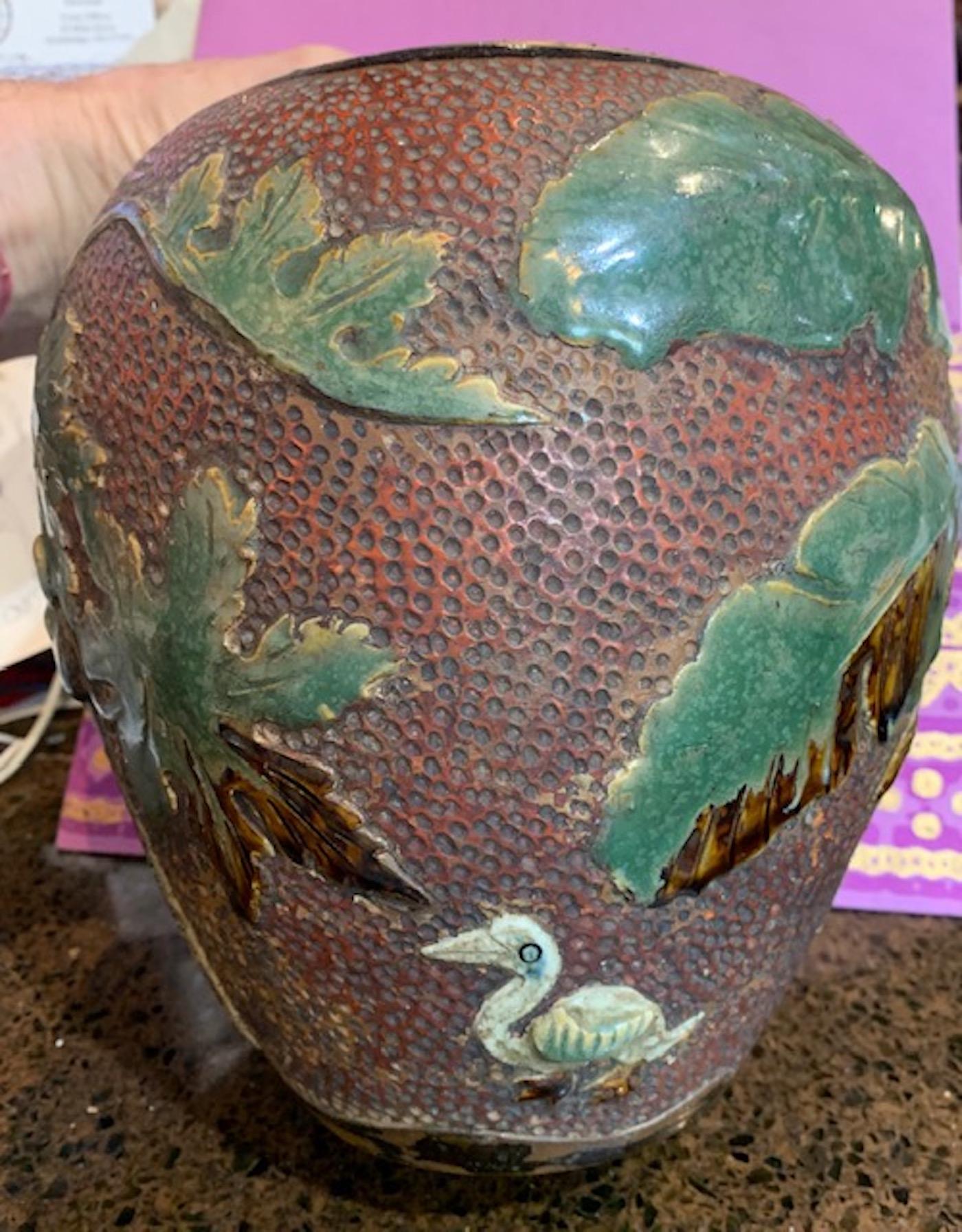 19th century Ryukyu Kingdom, (Present day Okinawa) Second Dynasty Tsuboya Ware urn. In addition to the production of funerary urns, The Ryukyuan Kingdom kilns also produced dishes, vessels, roof tiles and shiva kawara,( lion-like guardians placed on