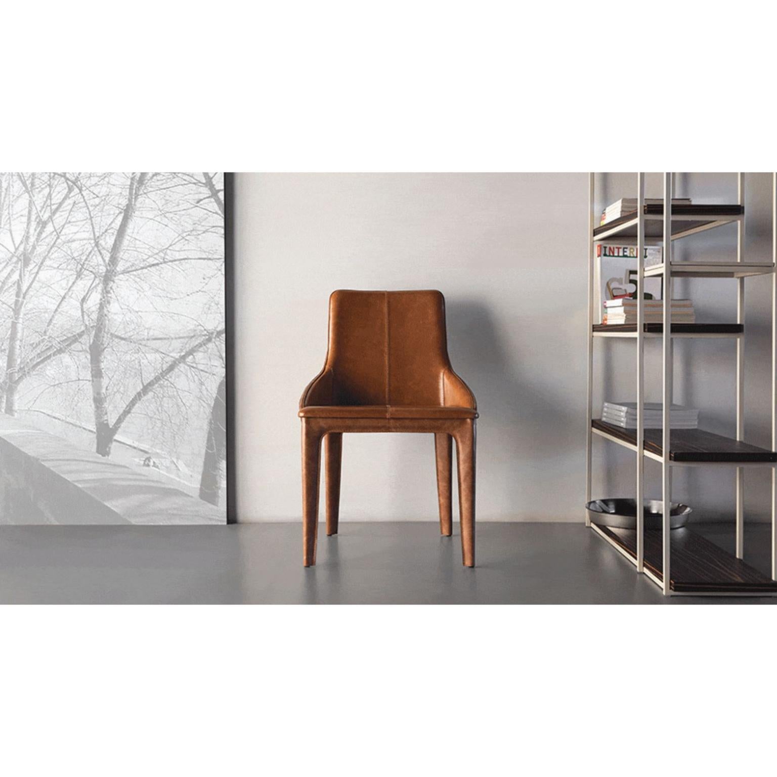 Ola Chair by Doimo Brasil
Dimensions: W 55 x D 57 x H 83 cm 
Materials: Metal, upholstered seat. 


With the intention of providing good taste and personality, Doimo deciphers trends and follows the evolution of man and his space. To this end, it