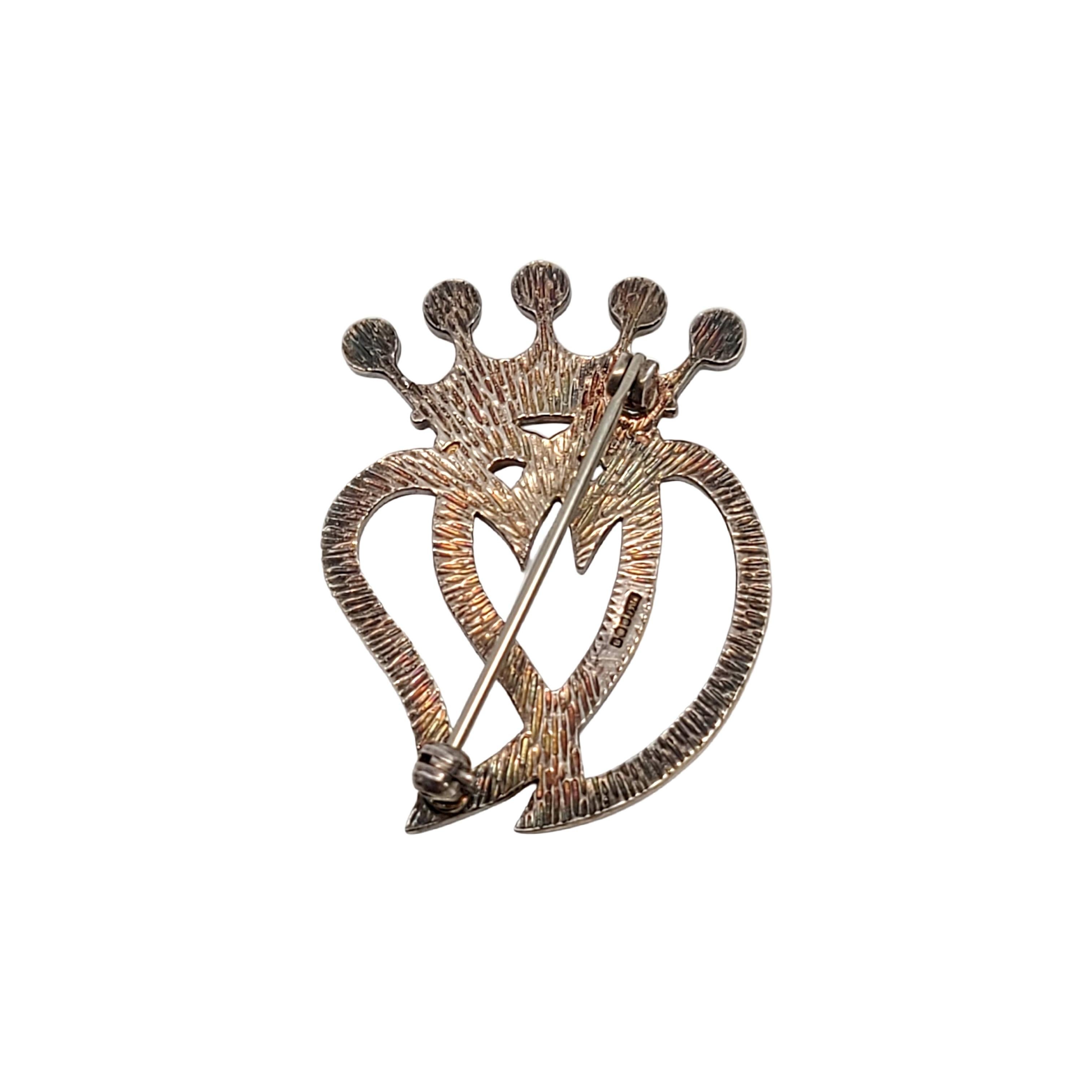 Vintage sterling silver Luckenbooth heart pin by designer Ola M Gorie, circa 1992.

Luckenbooth pins date to the 16th century in Edinburgh when it was common to give them as tokens of love or luck, to ward of witches.

Pin measures approx 1 1/2