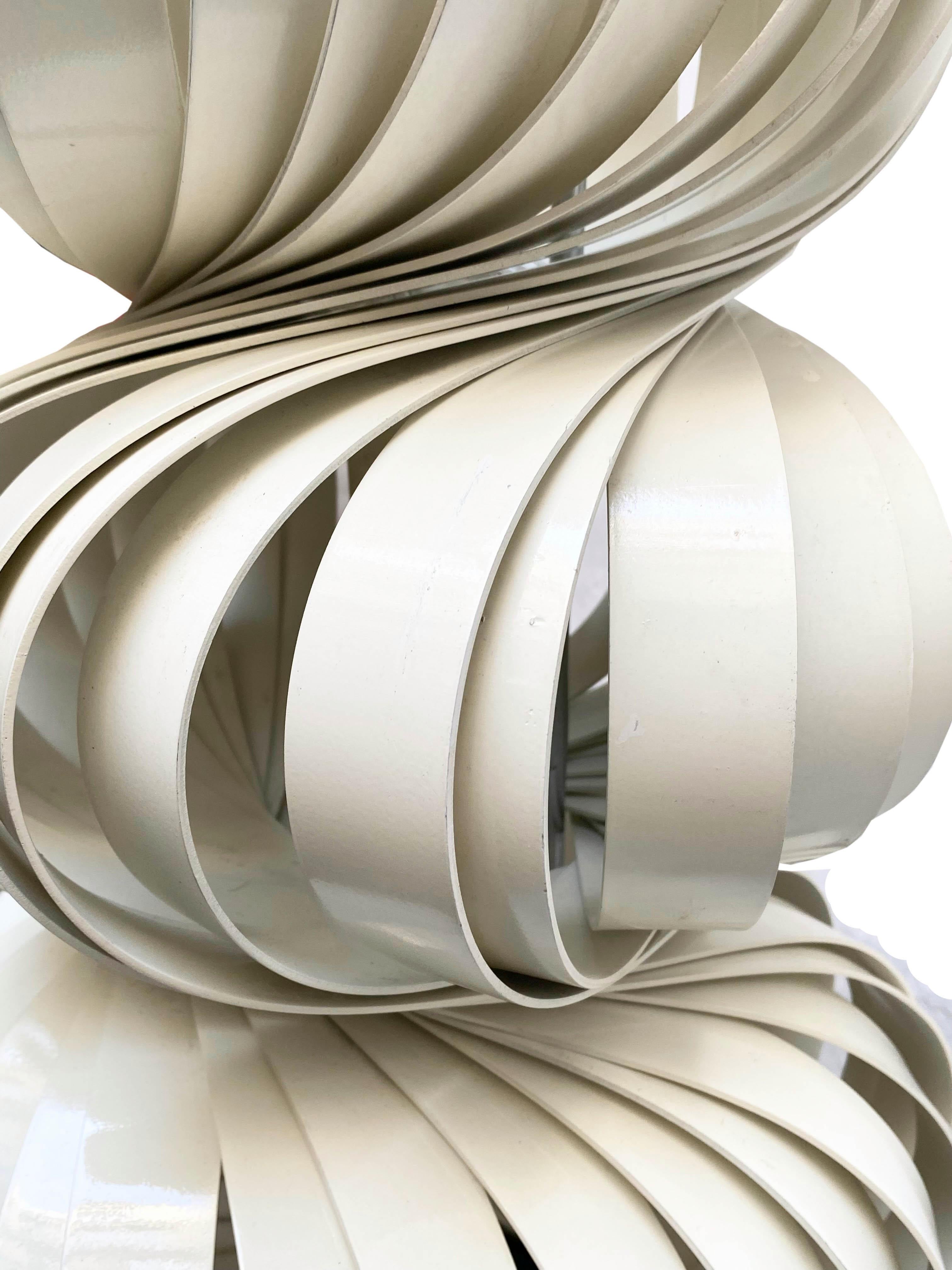 Olaf von Bohr, Austrian designer born in 1927. Medusa, lamp, model created in 1968. Composed of curved strips of white lacquered aluminium arranged in a spiral and a circular black lacquered base.