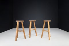 Set of 3 Brutalist Olavi Hänninen blond Elm Wood Bar Stools, Finland, 1960s