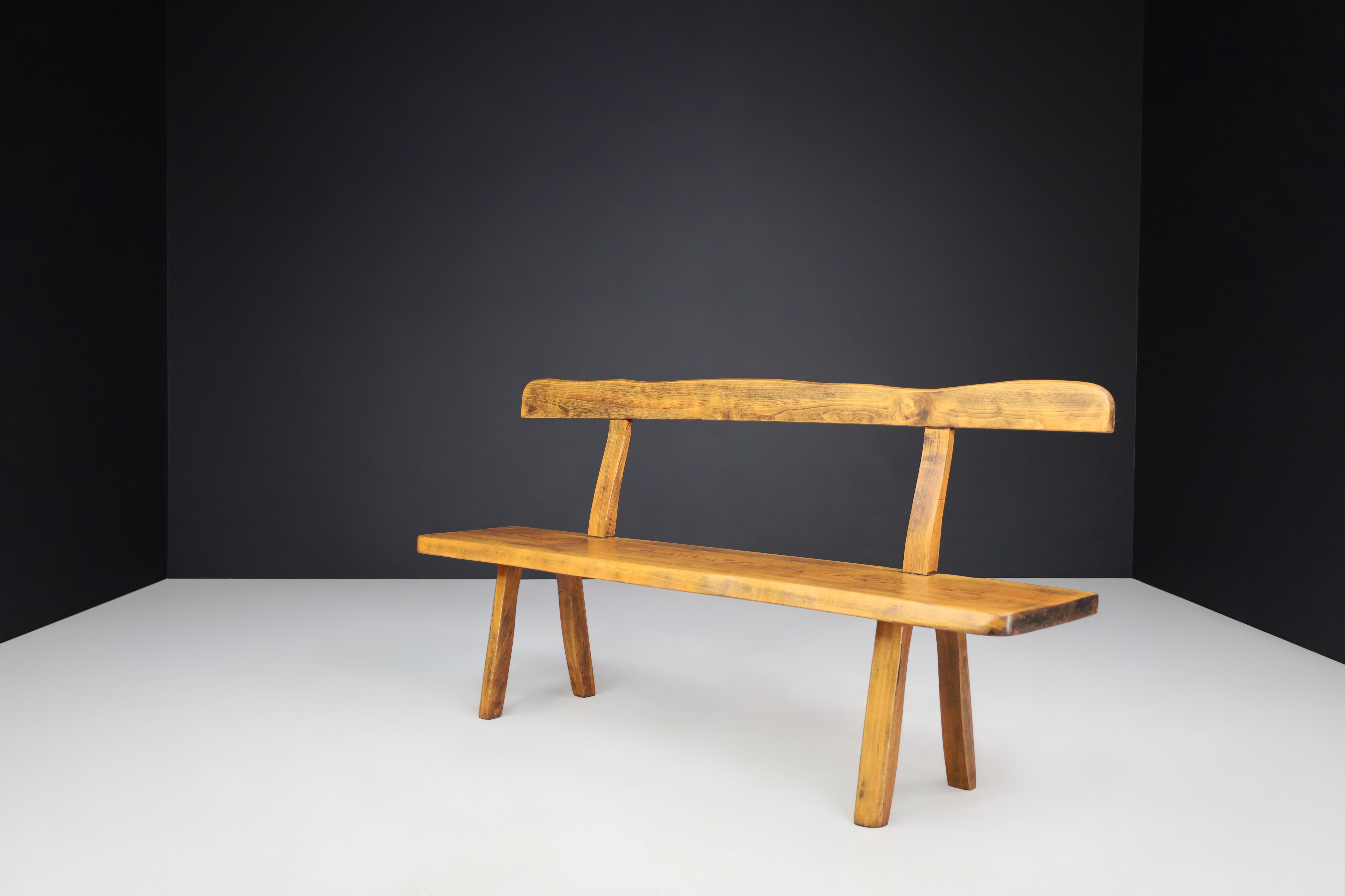 Olavi Hänninen for Mikko Nupponen sculptural bench, Finland, 1950s.

This sculptural bench is a beautiful piece of midcentury design, crafted by hand from stained elmwood by Olavi Hanninen and manufactured by Mikko Nupponen in Finland in the