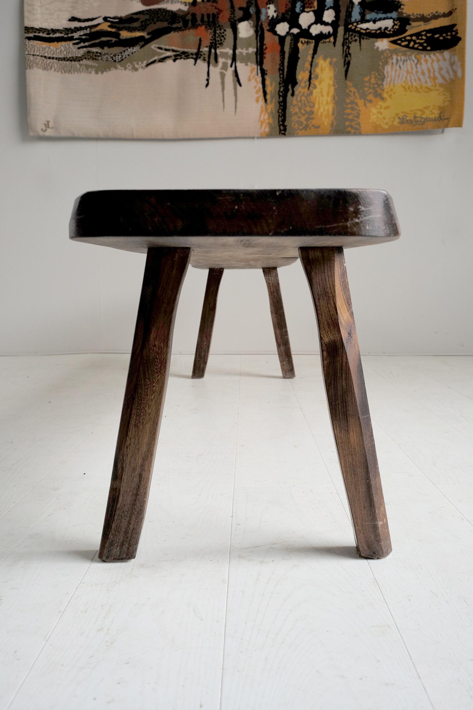 Olavi Hanninen, big bench in elm with dark patina for Mikko Nupporen, Finland 1960. With 240 cm of length, this bench welcomes 4 to 5 people.
It is part of a set including a large table and a series of ten chairs also on sale.
Very beautiful