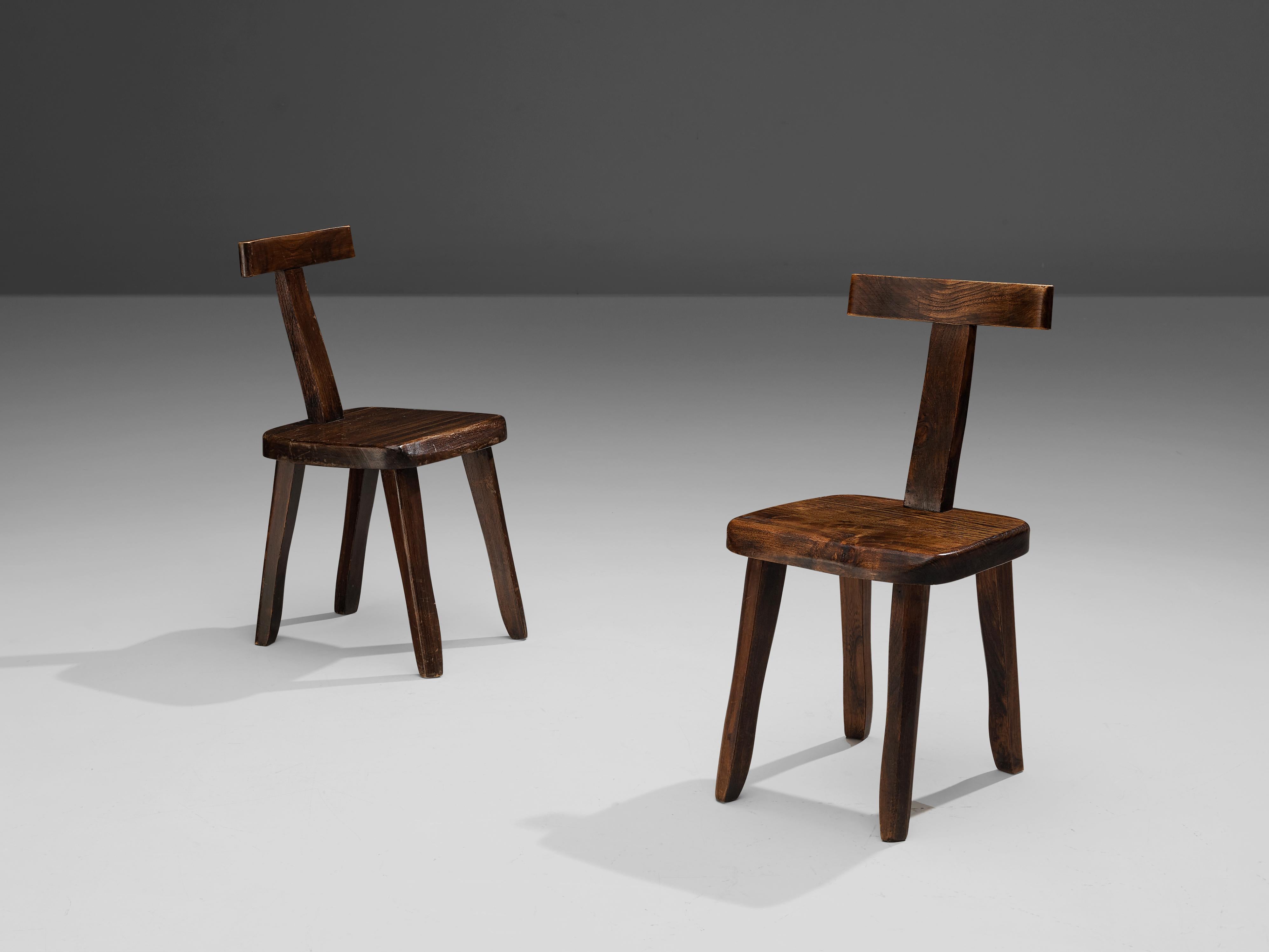 Olavi Hanninen for Mikko Nupponen, side chairs, stained elmwood, Finland, 1950s

Wonderful dining chairs or side chairs by Finnish designer Olavi Hanninen. The clean lines of the chairs are most present in the backrest. One vertical slat holds the