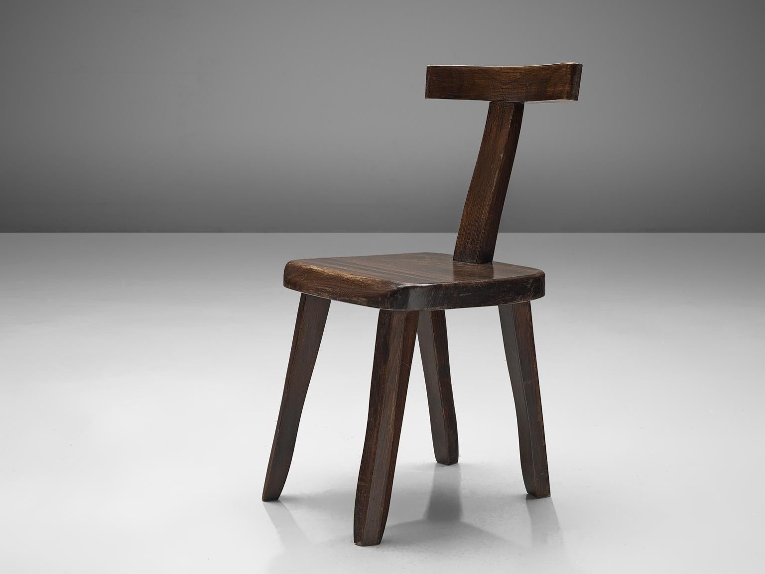 Olavi Hanninen for Mikko Nupponen, side chair, stained elm wood and brass, Finland, 1950.

Robust sculptural side chairs designed by Olavi Hanninen and manufactured by Mikko Nupponen. These chairs are made of stained elm wood and sculpturally
