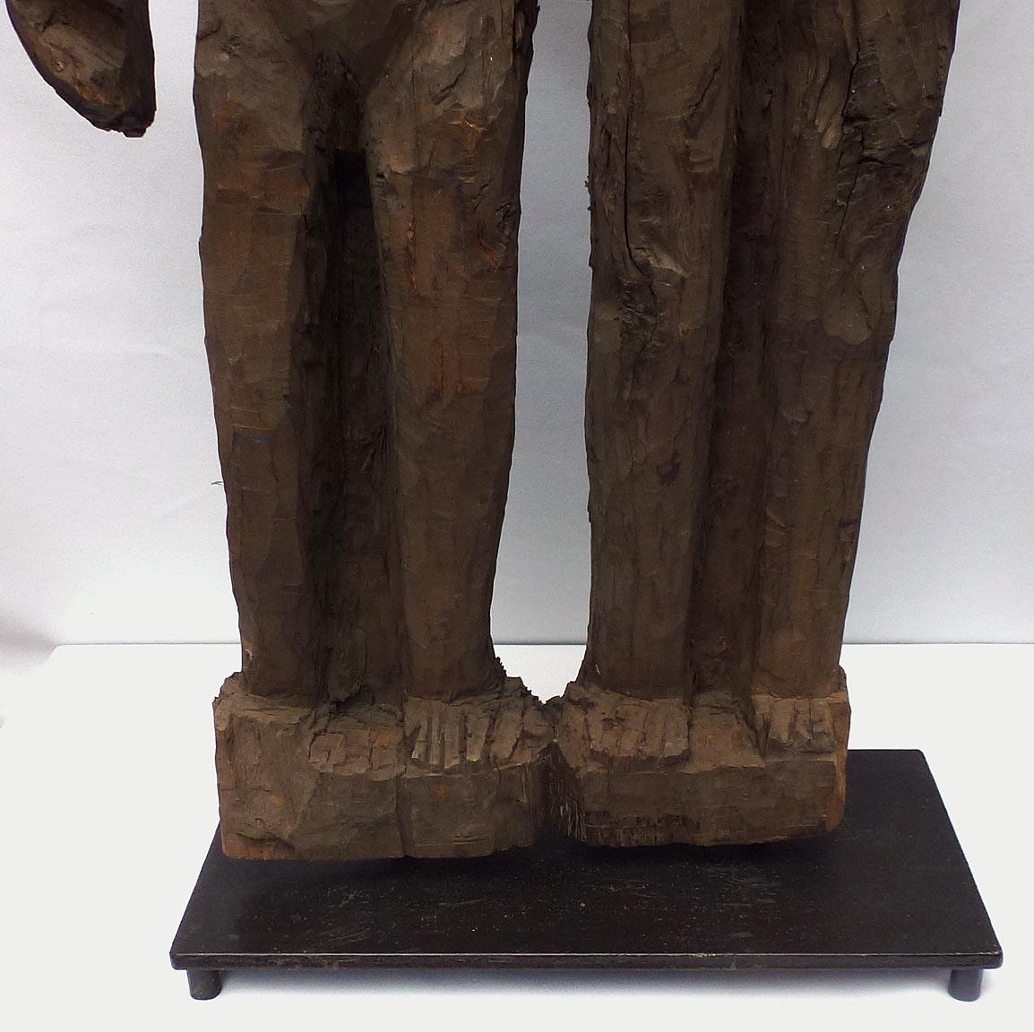 Old 4 foot high naive and stylized carving of two people from 1 slab of wood For Sale 2