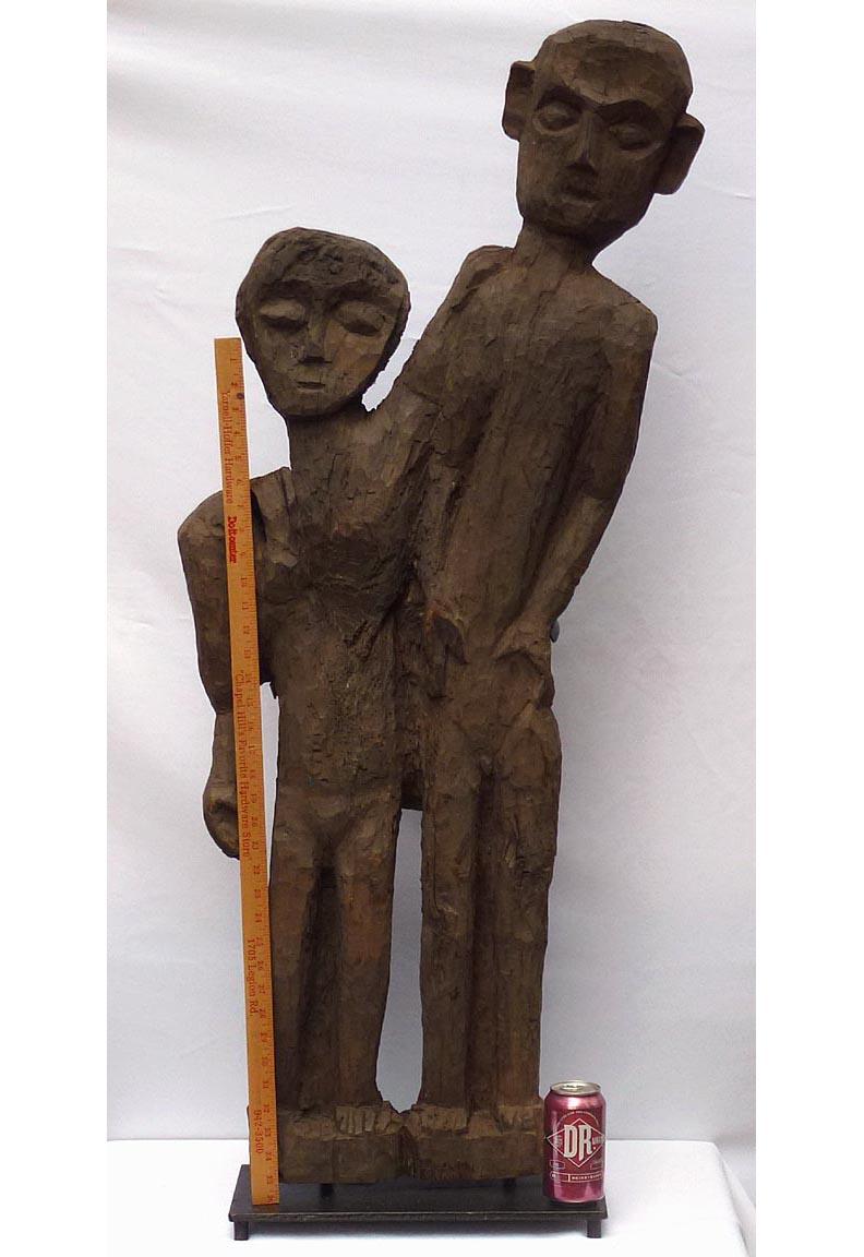 Old 4 foot high naive and stylized carving of two people from 1 slab of wood For Sale 4