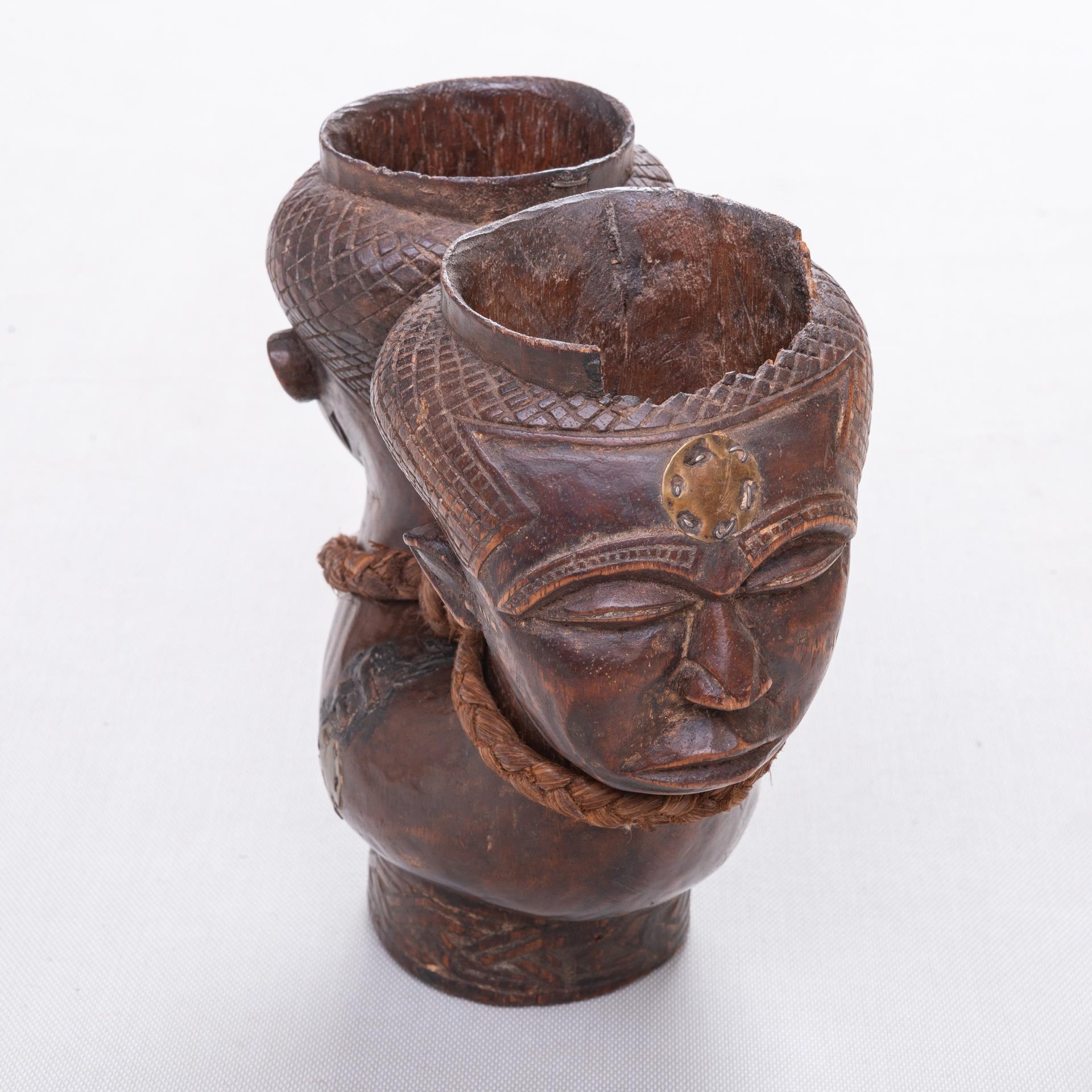 Hand-Crafted Old African Cup With Heads For Sale