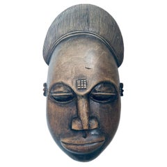 Old African mask in hand carved noble wood circa 1900