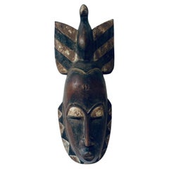 Old African mask in noble wood circa 1900.