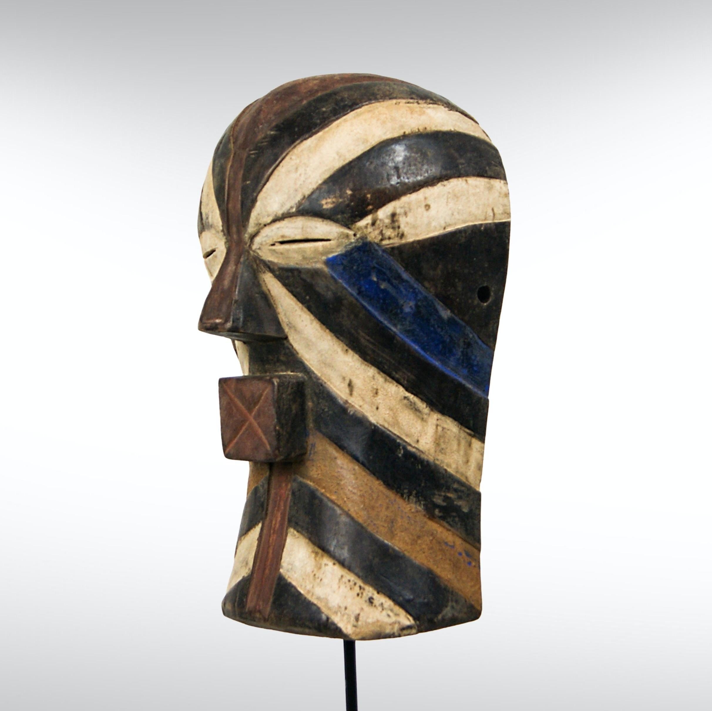 Large sized Songye Female Kifwebe mask from The Congo circa 1920s.
Traditionally, the Kifwebe mask is very symbolic in the Bantu culture of central Africa.
Its striking colours and carving symbolise the battle between good and evil.
Female Kifwebe