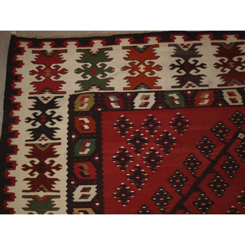 Turkish Old Anatolian Sharkoy Kilim Western Turkey of Traditional Design on a Red Ground For Sale