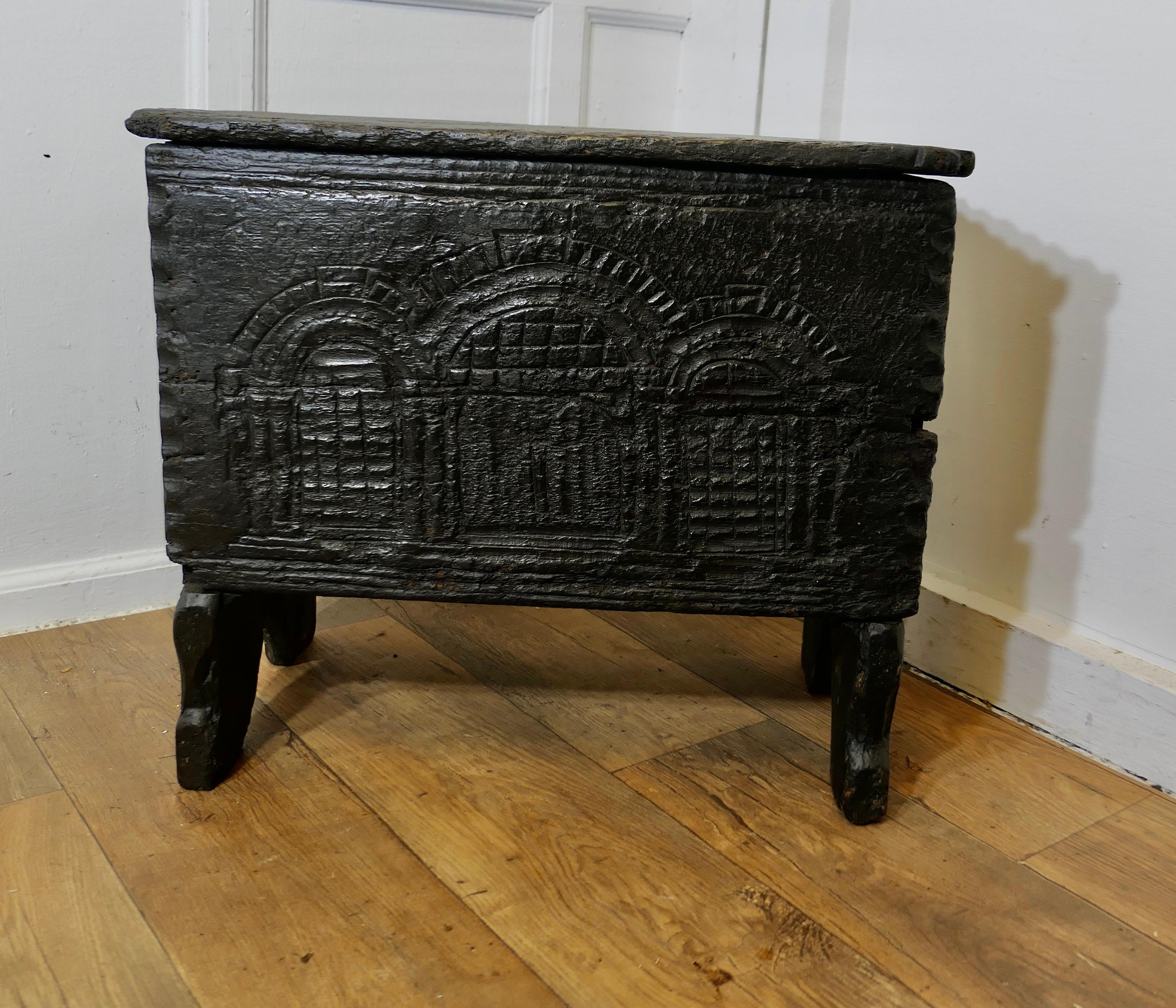 Old and Primitive Carved 16th Century 5 Plank Oak Coffer

This very old chest is made in Oak, it dates back to the time of HenryVIII 
The front of the chest is carved with a running motif of lancet arches which is very typical of a piece from this