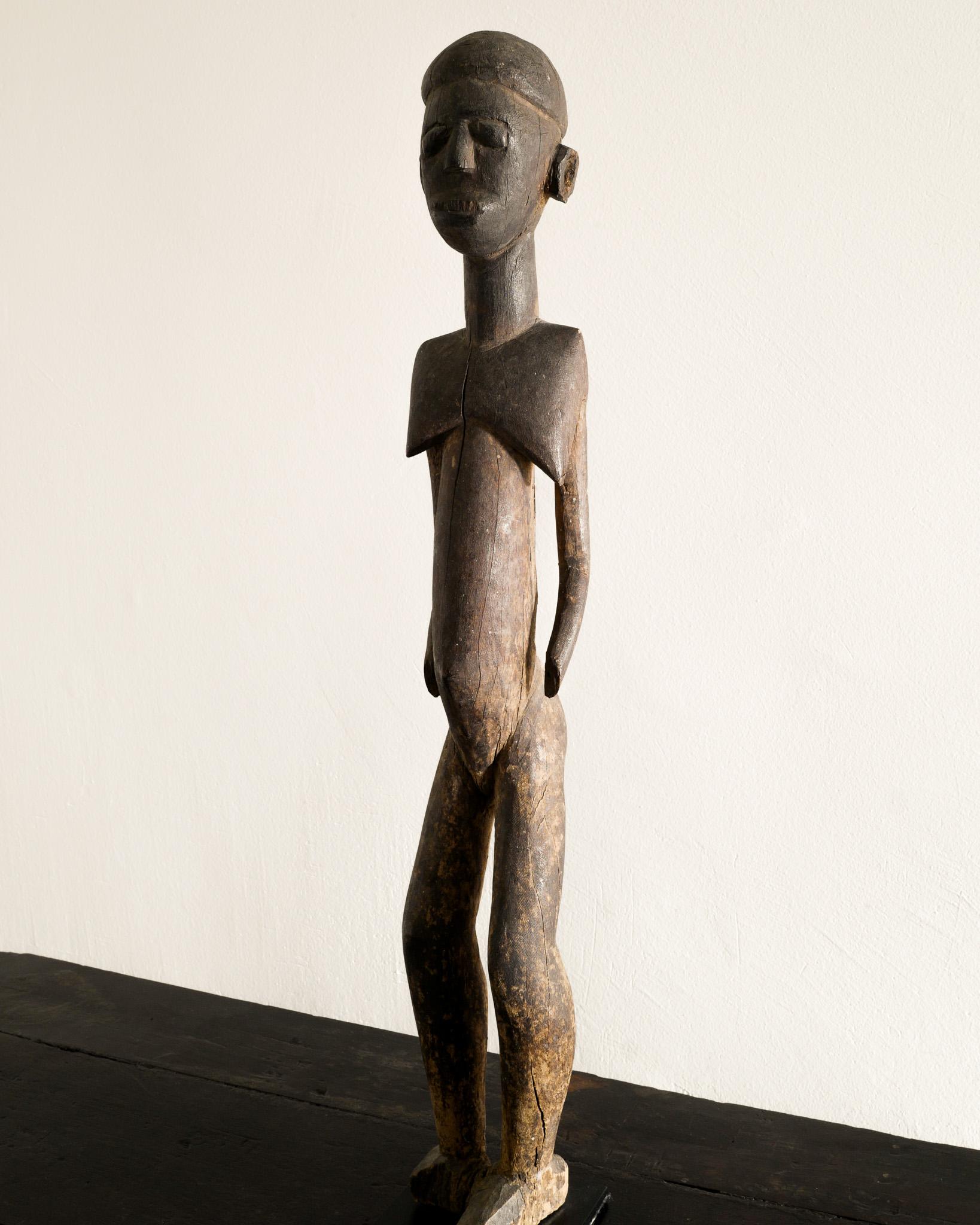 Burkinabe Old Antique Lobi Wooden Female Figure Sculpture Produced in Burkina Faso, Africa For Sale