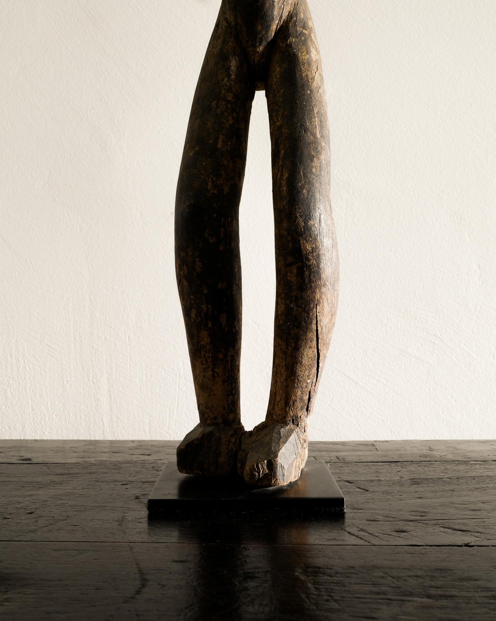 Mid-20th Century Old Antique Lobi Wooden Female Figure Sculpture Produced in Burkina Faso, Africa For Sale