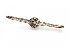 Old Art Deco gold brooch with diamonds, circa 1940s.