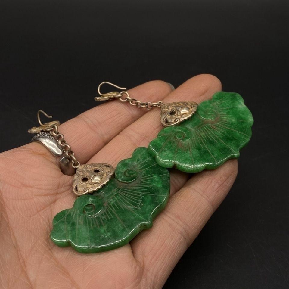 Vintage Tibetan Miao Silver Earrings with Jade Inlay – Handcrafted Ethnic Asian Jewelry

Celebrate the beauty of traditional craftsmanship with these Old Asian Handcrafted Tibetan Miao Silver Earrings, featuring genuine jade inlay. Meticulously