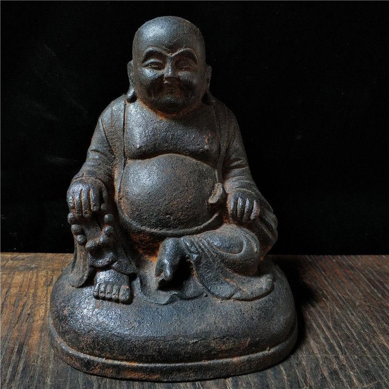 This smiling Old Asian Iron Sitting Maitreya Buddha Statue is nice and collectible.

Maitreya (Sanskrit: मैत्रेय; Chinese: 弥勒佛, Mílè Fó; Japanese: 弥勒菩薩, Miroku Bosatsu; Korean: 미륵보살, Mireuk Bosal) is a Bodhisattva who is prophesied to be the next