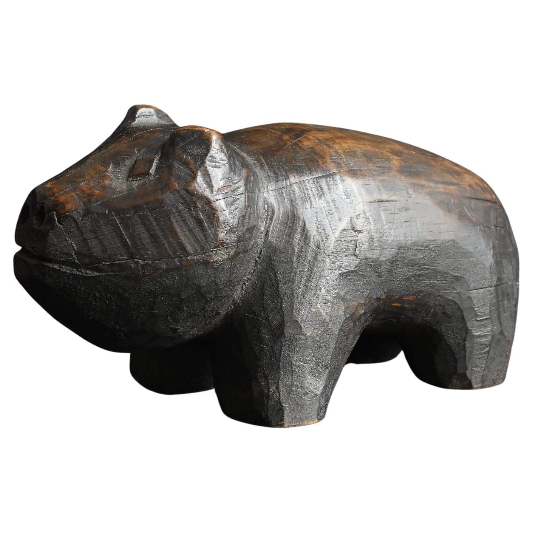 Old Asian wooden pig carving figurine / 20th century