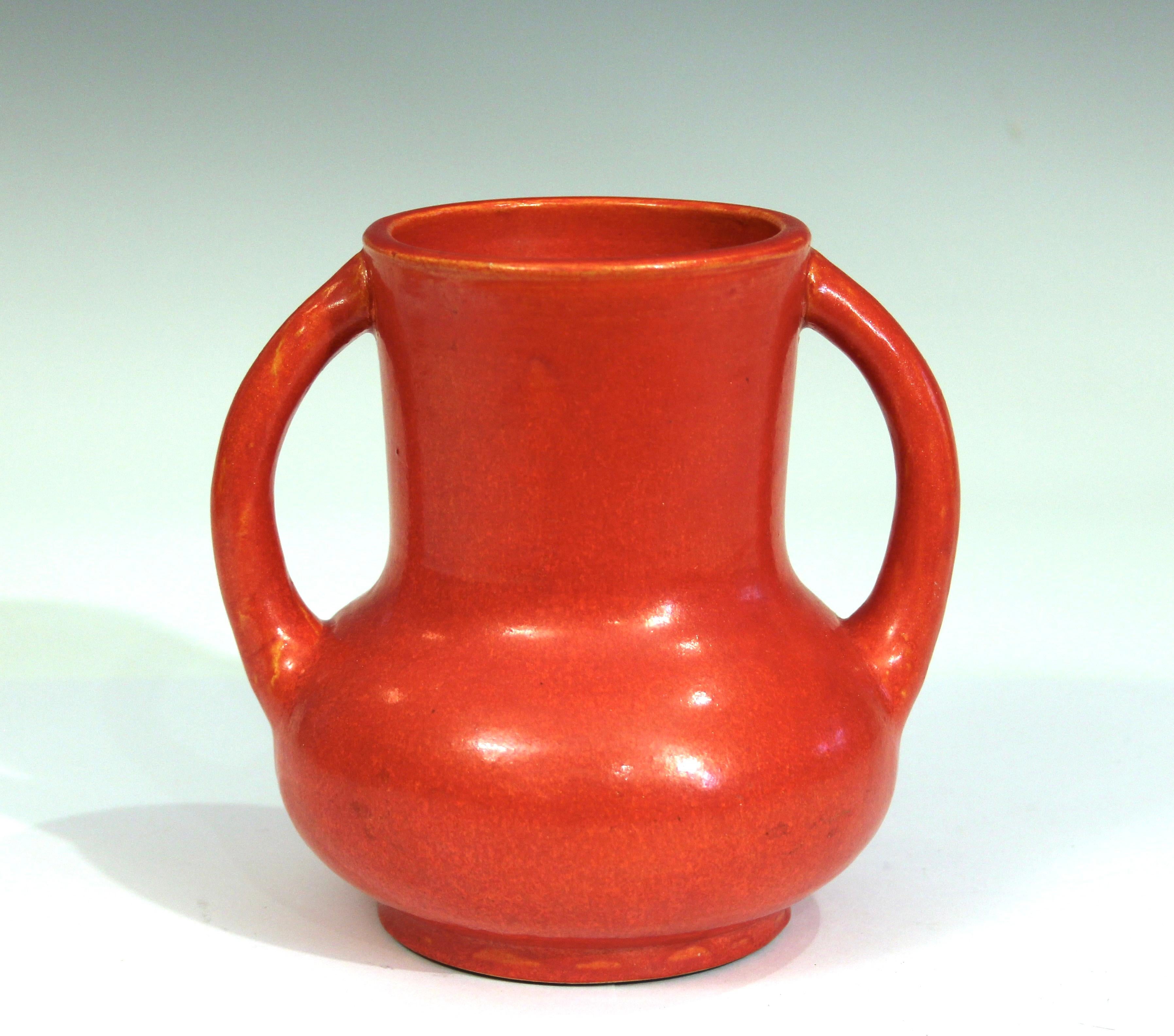 Old, hand turned, Awaji pottery vase in great, variegated chrome red glaze, circa 1930. Impressed marks on base partially obscured by the glaze. 5 1/2