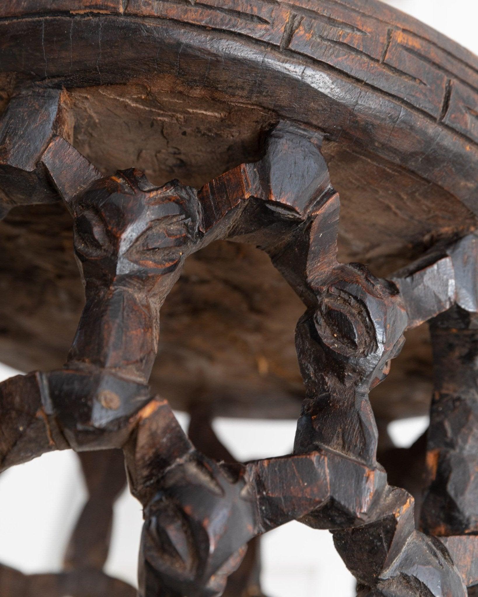 Old Bamileke stool side table from Cameroon African Art, 1950s

Original Bamileke Stool from the middle of the 20th century. 
This copy is a handmade one -off and was carved from a single block. The spider motif is of particular importance in