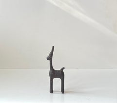 Figurilla de caballo ingenuo de hierro fundido antiguo de Bankura, mediados del siglo XX