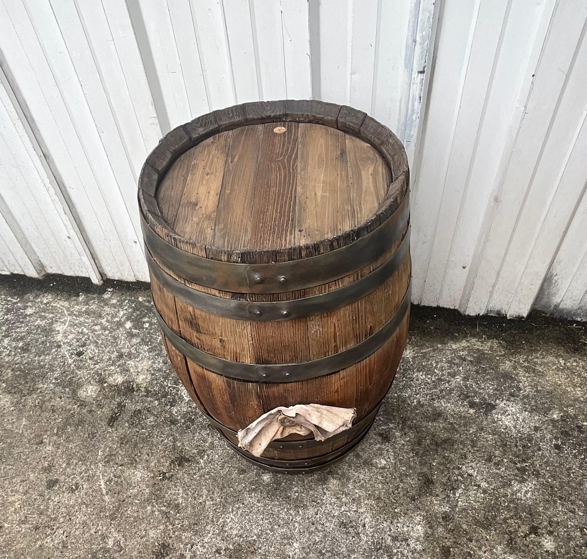 Old barrel of French manufacture

This cylindrical container is made of chestnut. 

This barrel has aged and blackened over time to the point of giving it a greyish color. This phenomenon is due to the oxidation of tannins.

The cooper used this