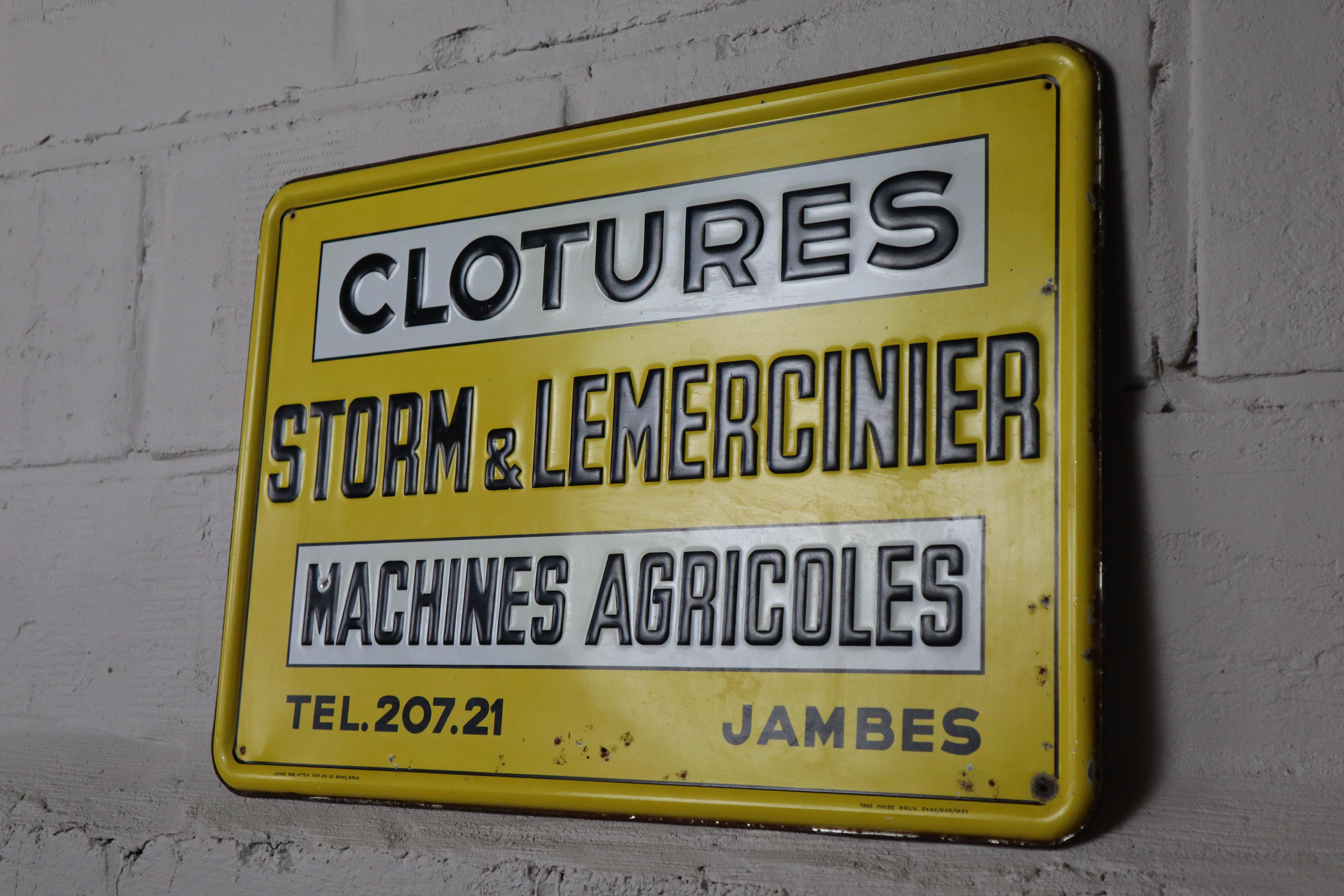 Tin advertising sign for 'Storm & Lemercinier', a company from the Belgian Ardennes that specialized in gates and agricultural machinery.

The sign was manufactured in 1951 by Rob Otten (Brussels), a company well known among collectors of publicity
