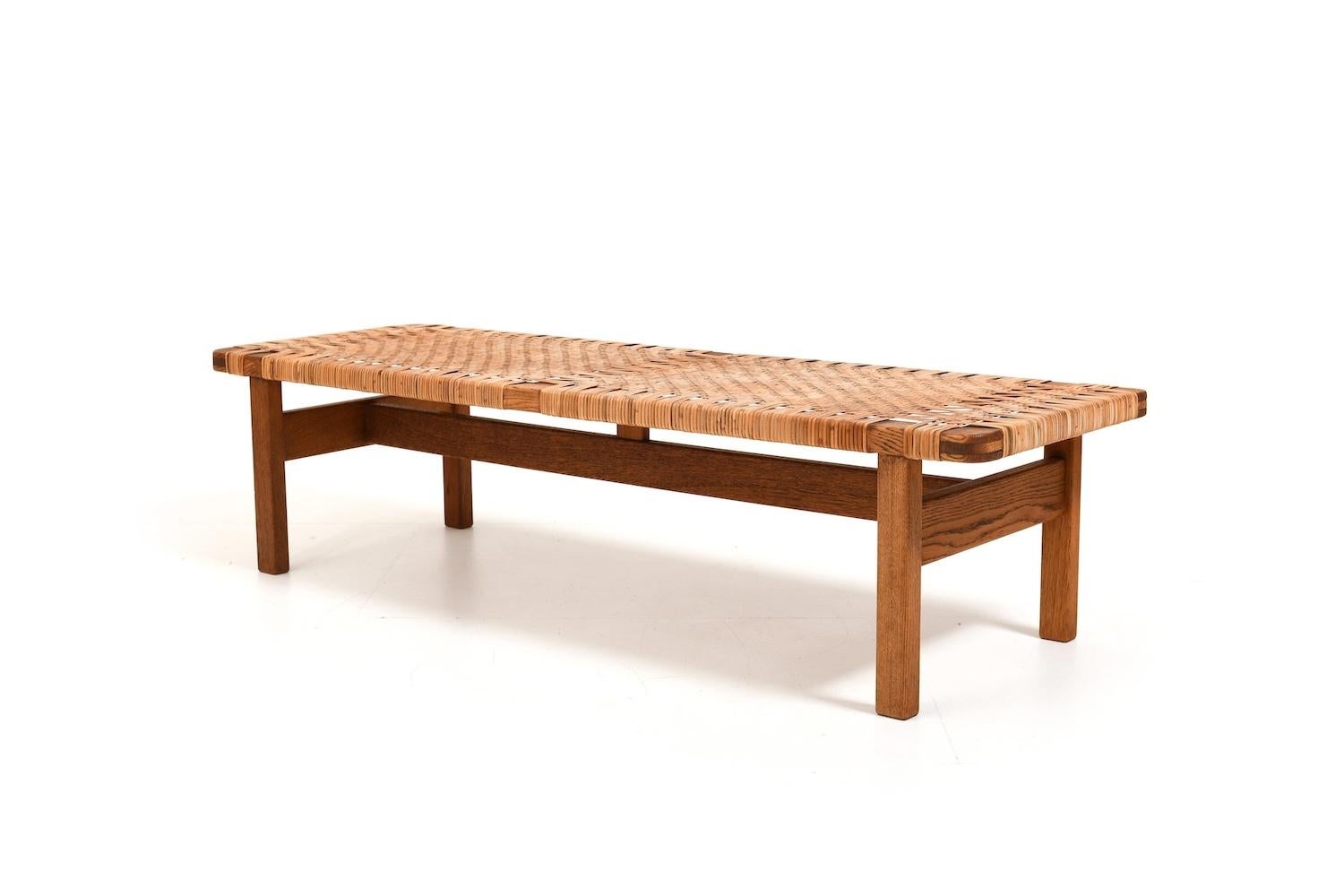 Beautiful old bench, model 5272 (272 stamped) by Børge Mogensen for Fredericia Stolefabrik Denmark 1950s. Made in solid oak and cane. Produced in 1950s. Untouched condition with patina. Withe old brandmark underneath.