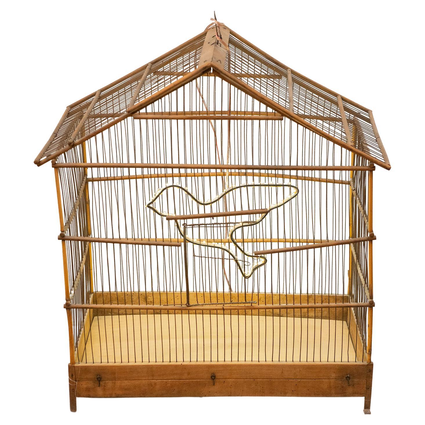 Old Bird Cage with a Bright Little Bird For Sale