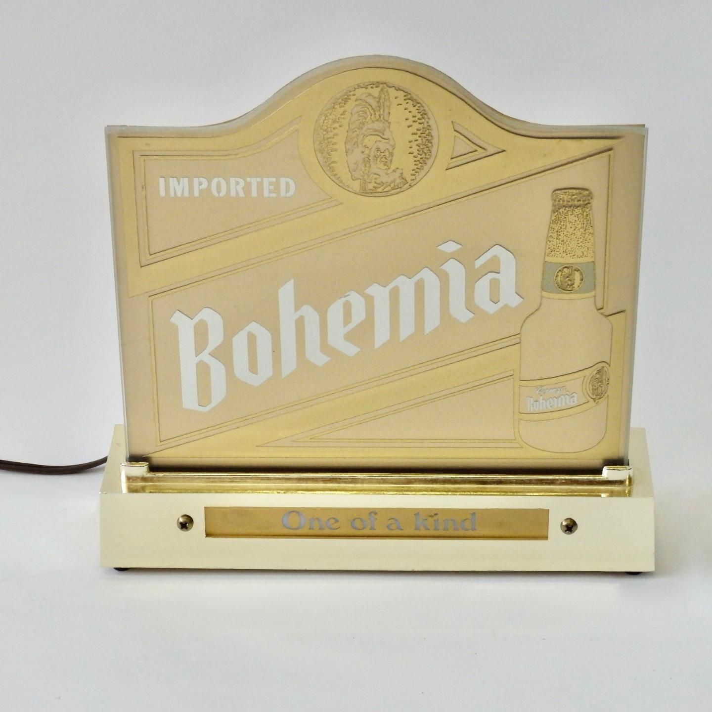 Excellent possibly un-used condition. Brass tone base holds reverse painted glass with Bohemia logo.