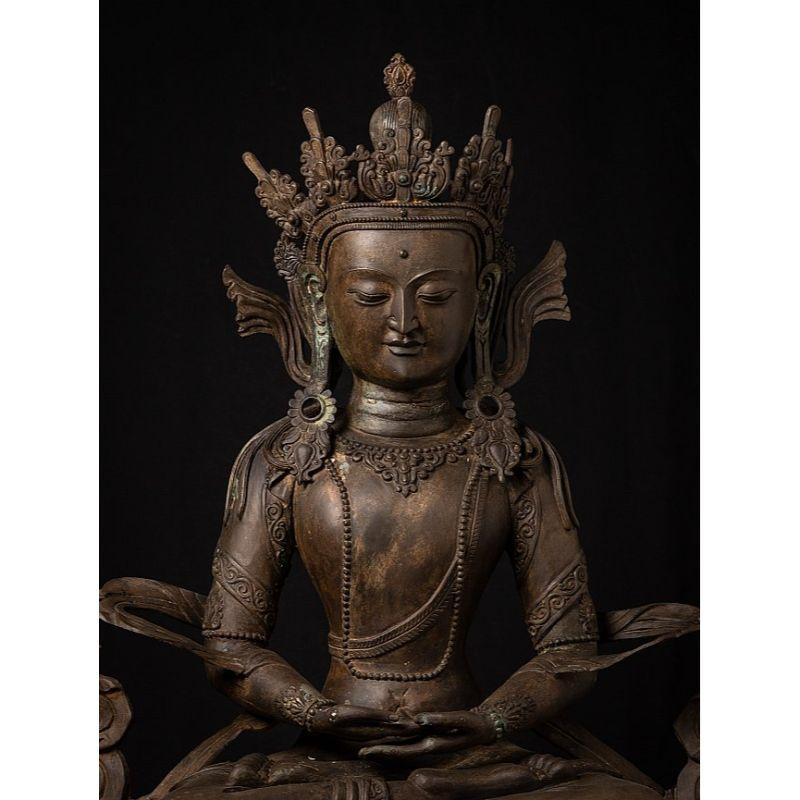Material: bronze
96 cm high 
78 cm wide and 44 cm deep
Weight: 32 kgs
Dhyana mudra
Originating from China
Late 20th century

