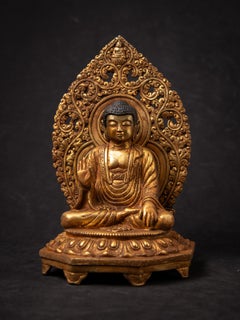 Old bronze Japanese Amida Buddha statue from Japan