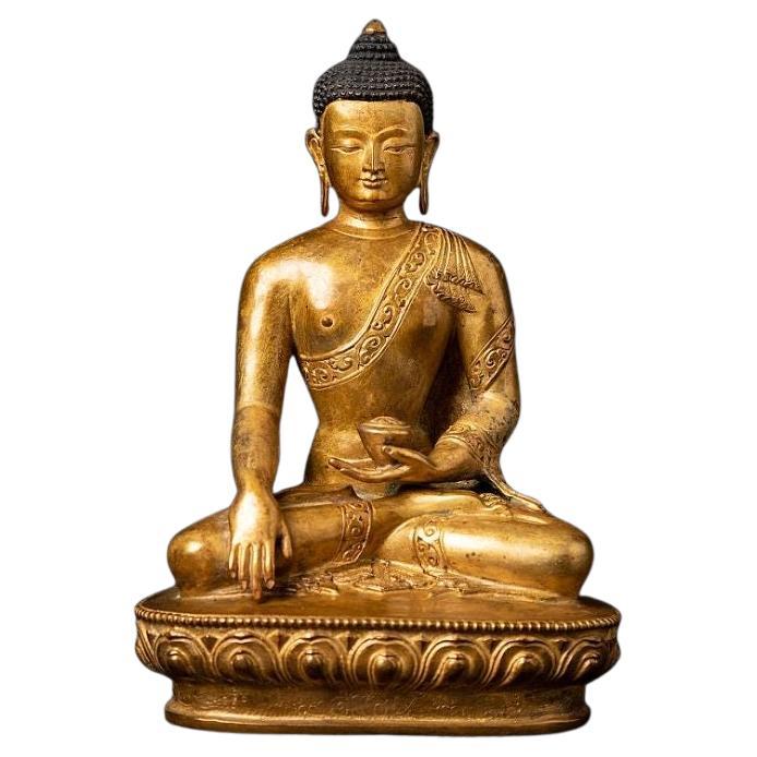 Vecchia statua di Buddha nepalese in bronzo dal Nepal