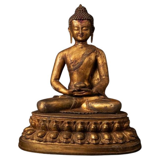Ancienne statue de Bouddha népalais en bronze du Népal