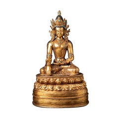 Ancienne statue de Bouddha népalais couronnée en bronze du Népal
