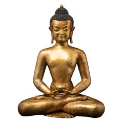 Old bronze Nepali gilded Buddha statue from Nepal