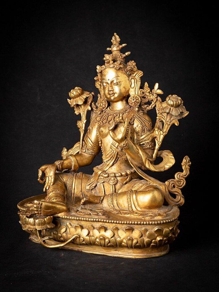 Material: bronze
30,9 cm high 
26 cm wide and 19,3 cm deep
Weight: 5.597 kgs
Fire gilded with 24 krt. gold
Originating from Nepal
Middle 20th century
Very high quality !
