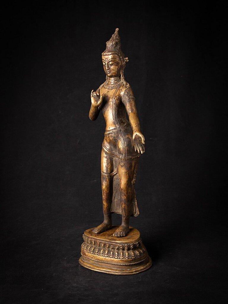 Material: bronze
46,9 cm high 
17 cm wide and 14 cm deep
Weight: 4.320 kgs
Fire gilded with 24 krt. gold
Vitarka mudra
Originating from Nepal
Early 20th century.
 