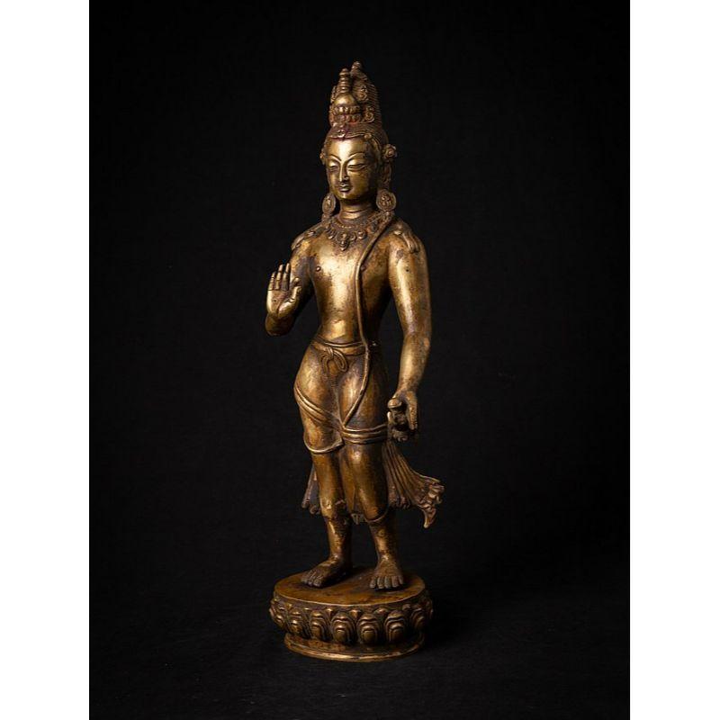 Material: bronze
51,7 cm high 
17 cm wide and 12,2 cm deep
Weight: 7.3 kgs
Fire gilded with 24 krt. gold
Vitarka mudra
Originating from Nepal
Early / middle 20th century.
 