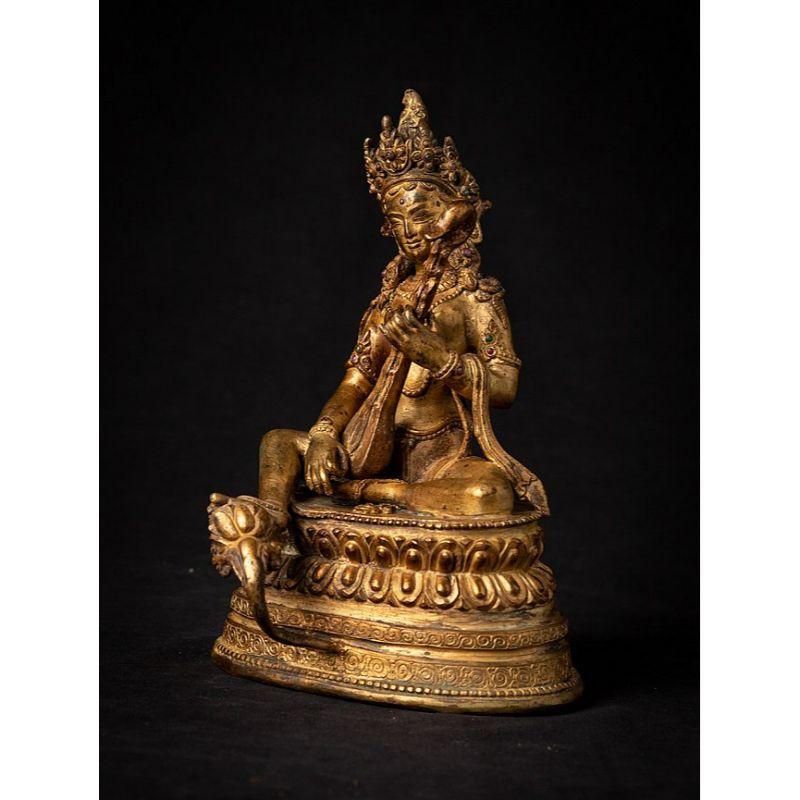 Material: bronze
21,5 cm high 
14,2 cm wide and 12 cm deep
Weight: 1.533 kgs
Fire gilded with 24 krt. gold
Originating from Nepal
Middle 20
 