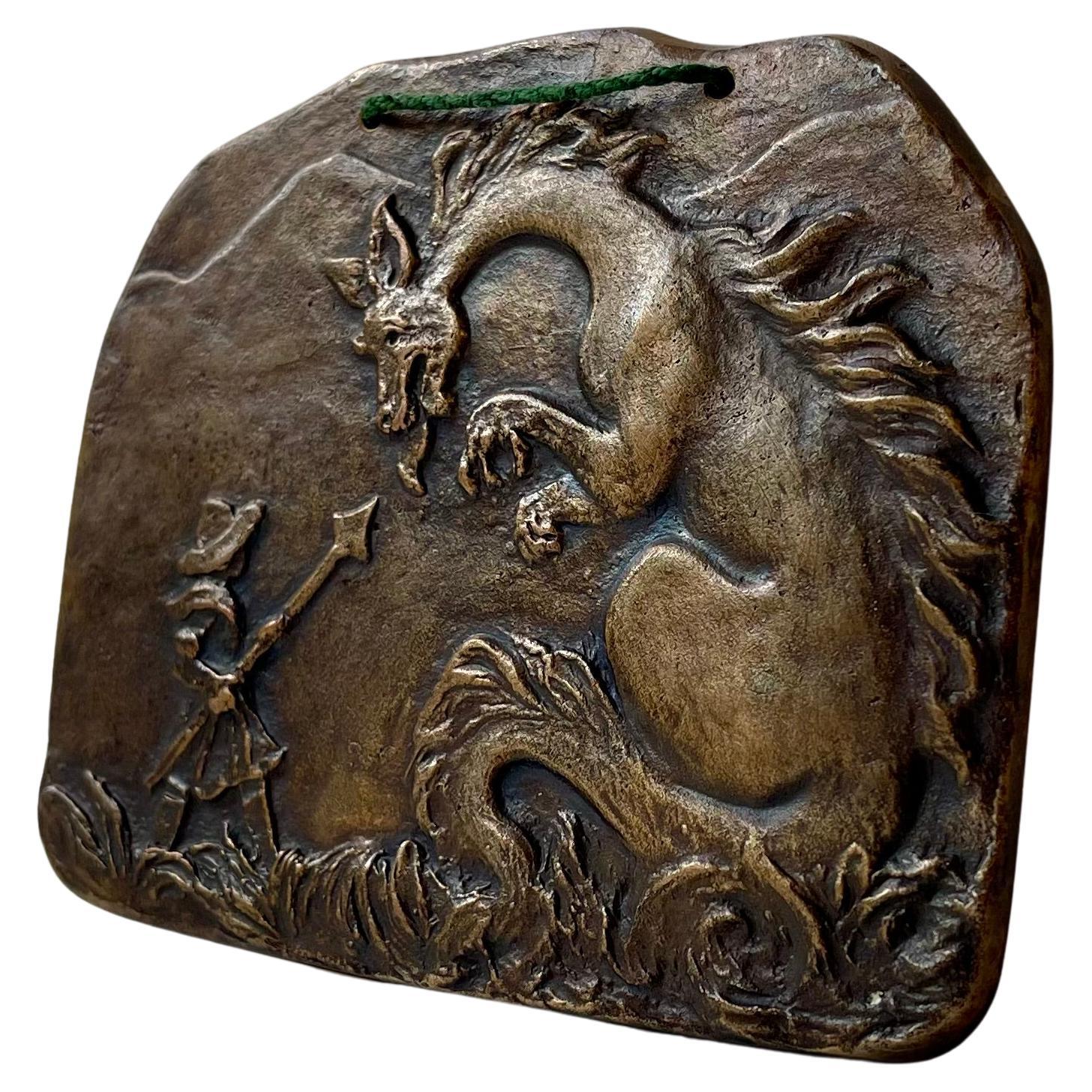 Altes Bronze-Wandrelief eines Drachenschmiedeeisens