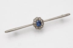 Old brooch with cluster sapphire and 0.50ct old cut diamonds, early 20th century