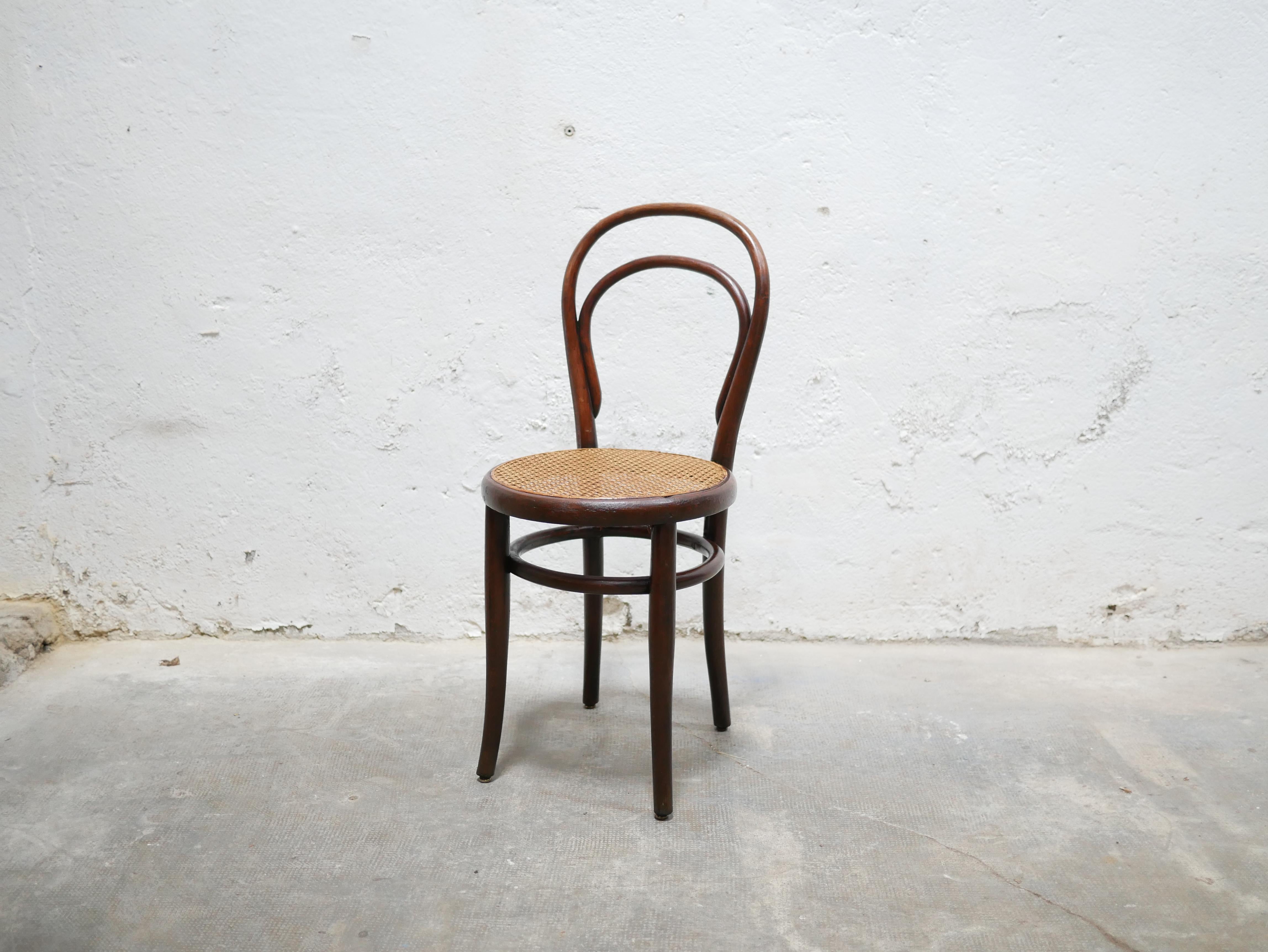 Old cane bistro chair by Thonet editions 1