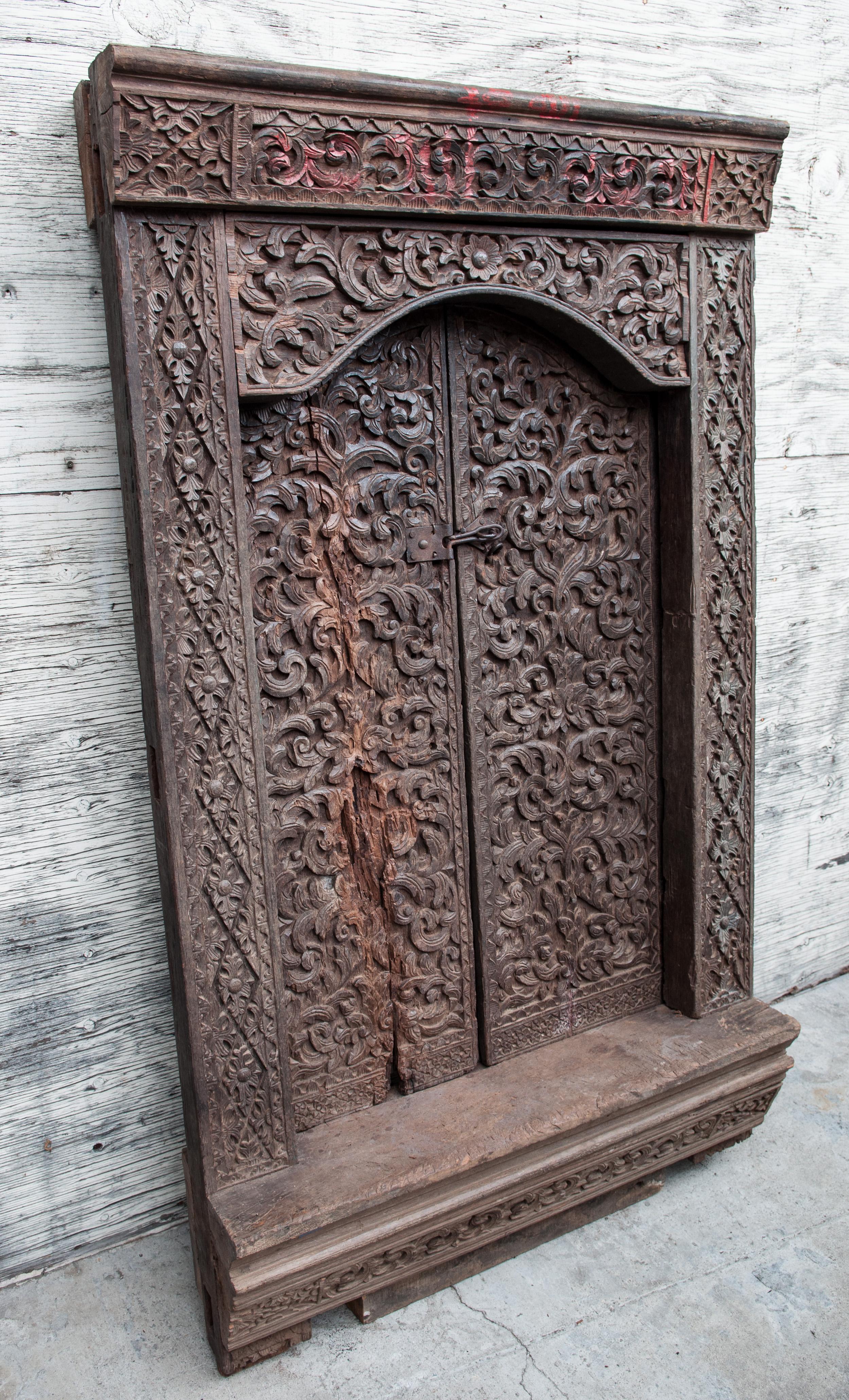Hand-Carved Old Carved Door and Frame from Sumatra, Merbau Wood, Early to Mid-20th Century. 