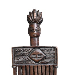 Old carved wooden comb from the Chokwe/Lwena tribe , early 1900